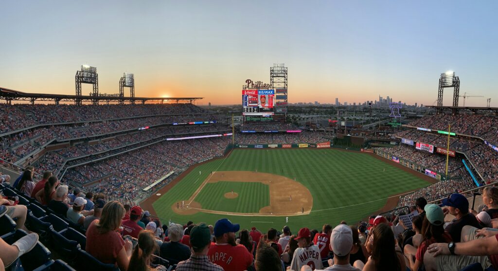 A full crowd inside Citizens Bank Park during golden hour