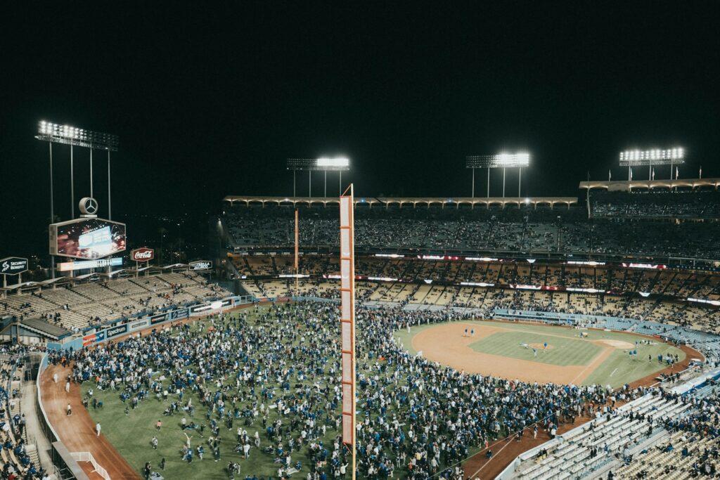 Fans fill Dodger Stadium under the lights at night