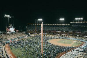 Fans fill Dodger Stadium under the lights at night